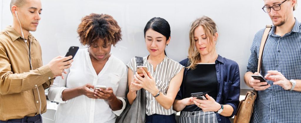 People using their mobile phones